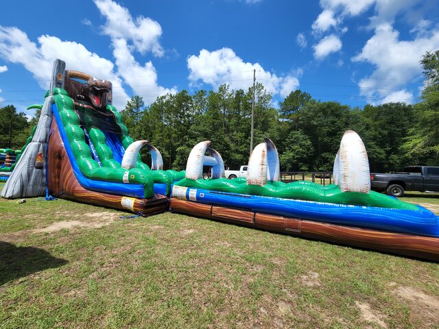 22ft Jurassic Rush w/ Slip n slide and pool
